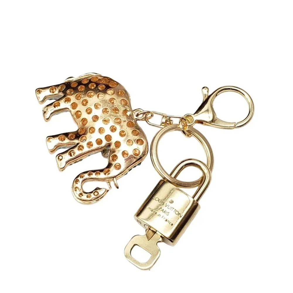 Authentic Louis Vuitton Lock & Key with unbranded Elephant Bagcharm, Keycharm